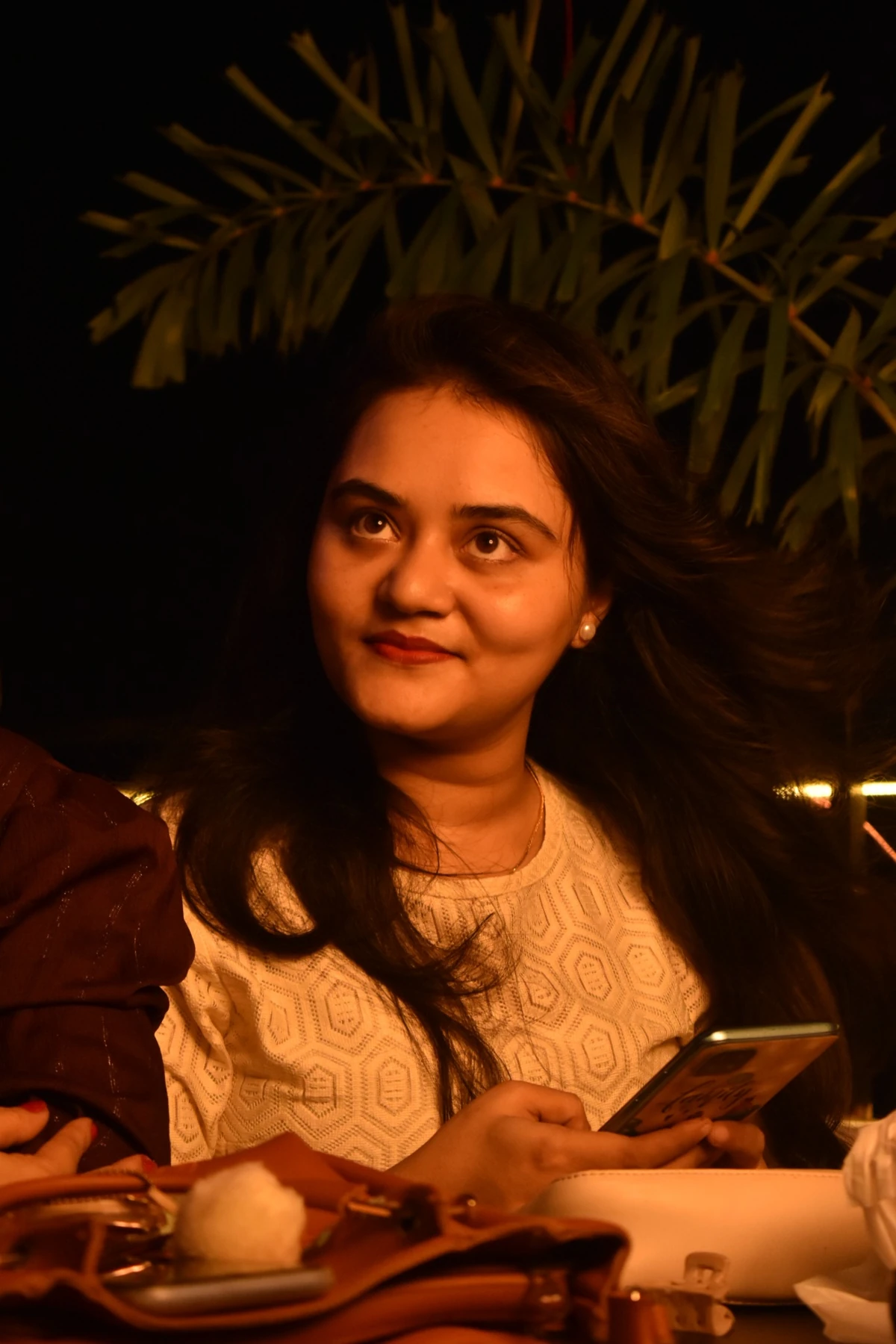 Candid portrait with phone